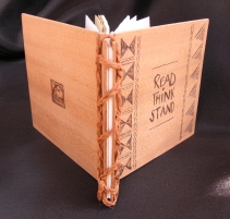 Wooden covered book with coconut sinnet binding